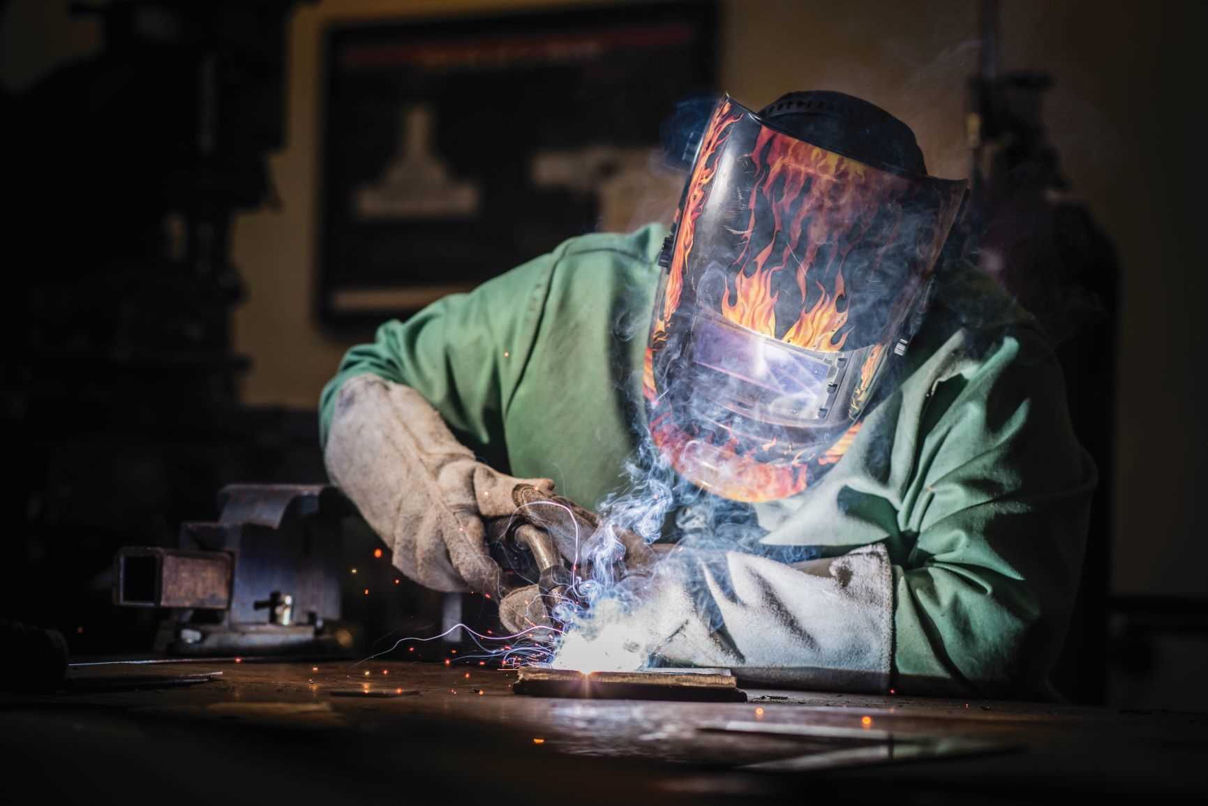 Welder learning to weld MIG
